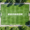 爱游戏体育官网Logo - 俯视视角的绿色足球场地标识图案